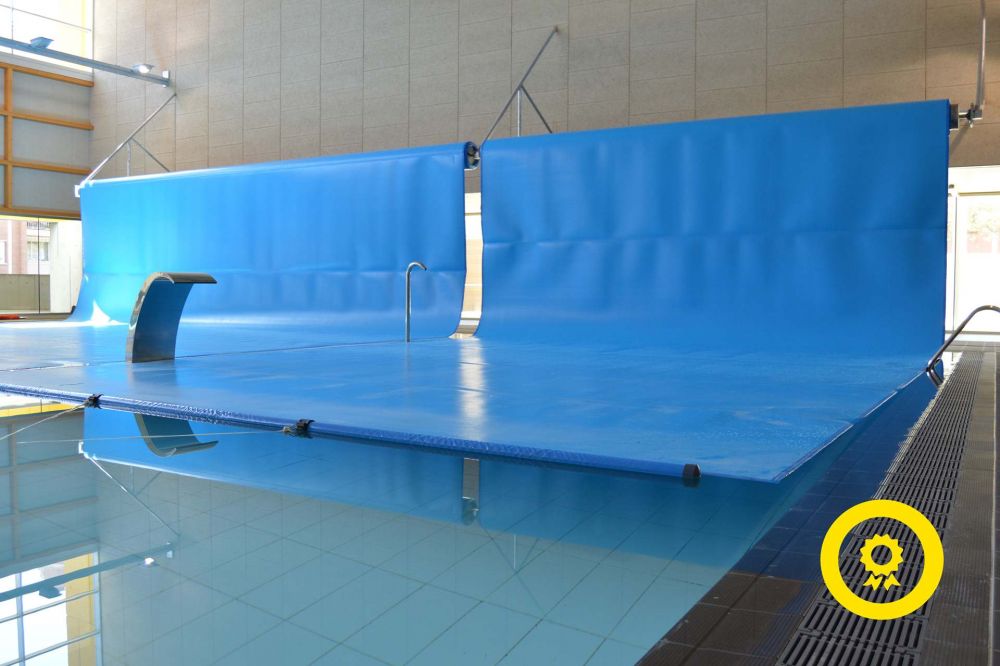 cobertor para piscina interior con instalación elevada